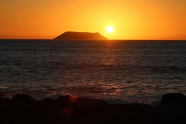 Galapagos Sea Star’s 10-Day A+B Itinerary Day Seven - Chinese Hat at Sunset.