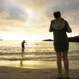 People watching sunset on the beach
