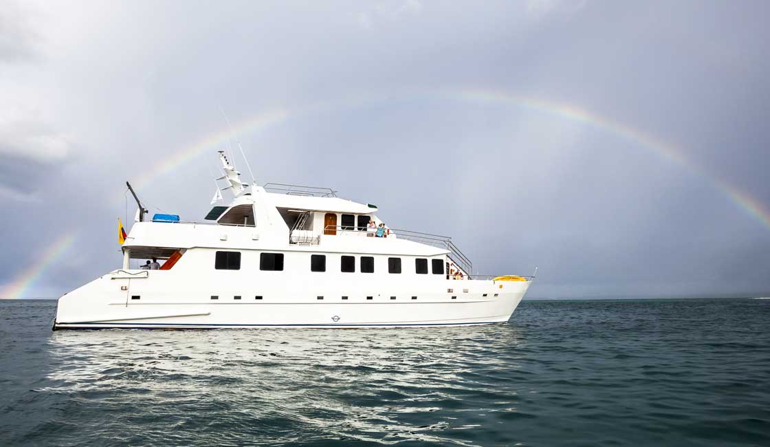 Ship at sea and a rainbow