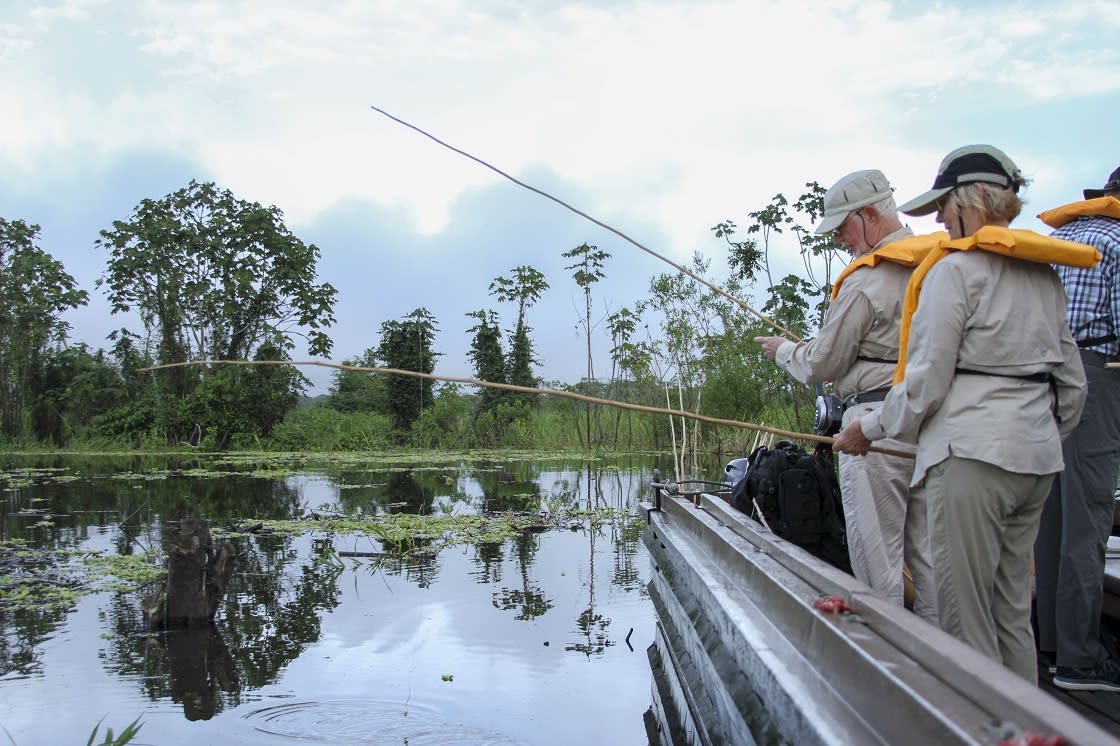 Group Of Tourists Out On A Piranha FIshing Excursion