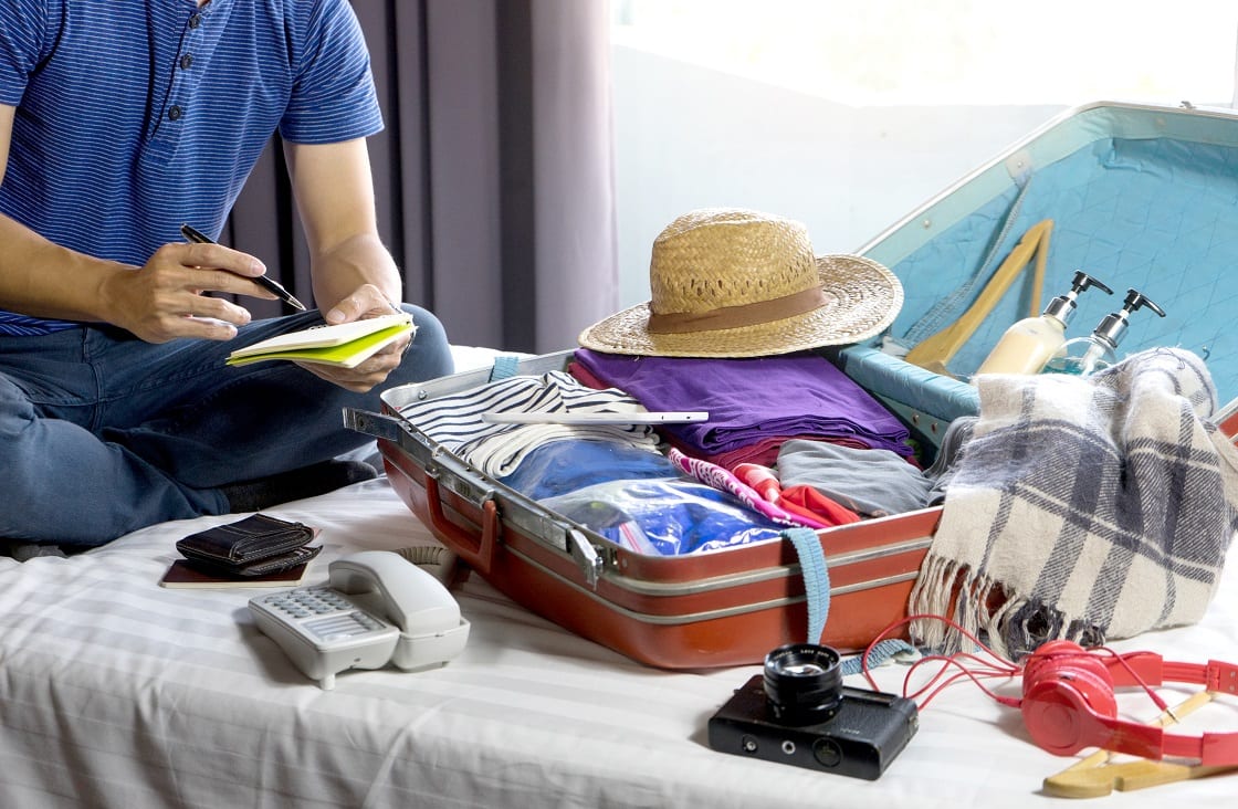 Man,Packing,The,Luggage,Prepare,For,Their,Journey,Trip,With