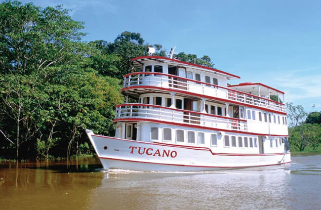 Tucano on the river