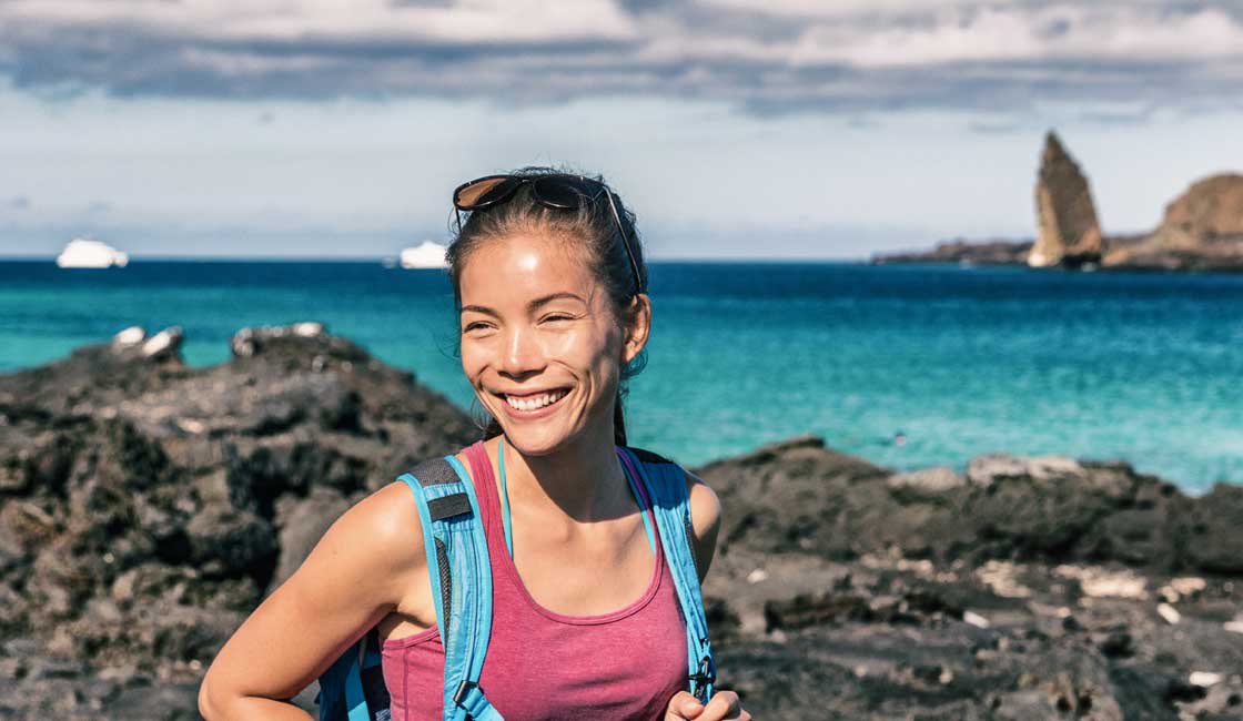 GIrl with a small backpack in Galapagps